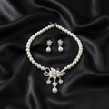 Vintage Romance Pearl Bow Set on black silk