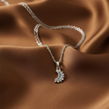 Luna Celestial silver crescent moon pendant necklace on brown silk