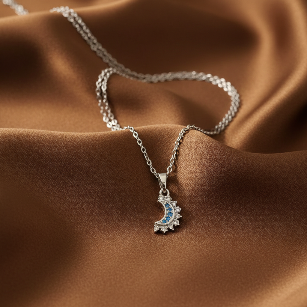 Luna Celestial silver crescent moon pendant necklace on brown silk